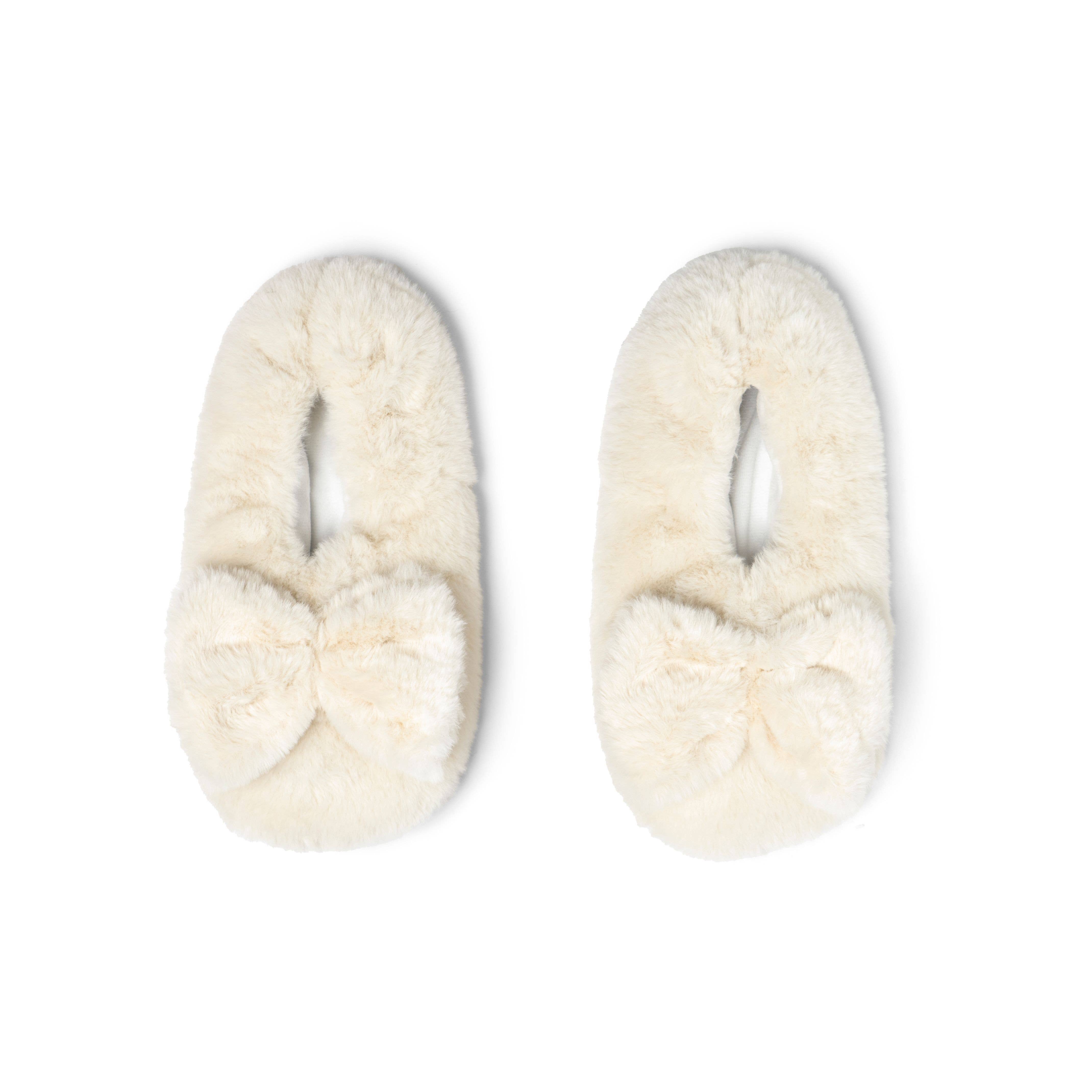 cream colored microwavable plush heated slippers with weighted spa bead upper