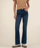 person wearing the kelsey hi rise fab ab denim with front seam in the color, envision / dark wash denim