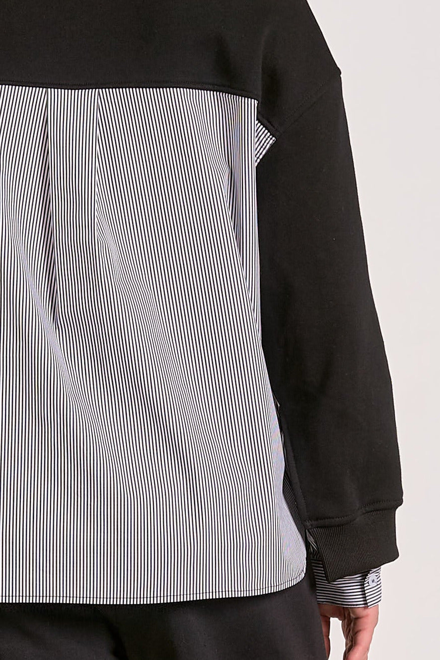 Close up of the back side showing the pinstripe detail of the long sleeve mixed media crewneck.