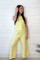 model in Mac and Me Cozy Pant in sunshine yellow paired with matching Mac and Me sleeveless top
