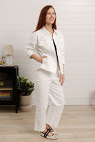 Mac and Me white denim jacket and jeans outfit, full-length styling view