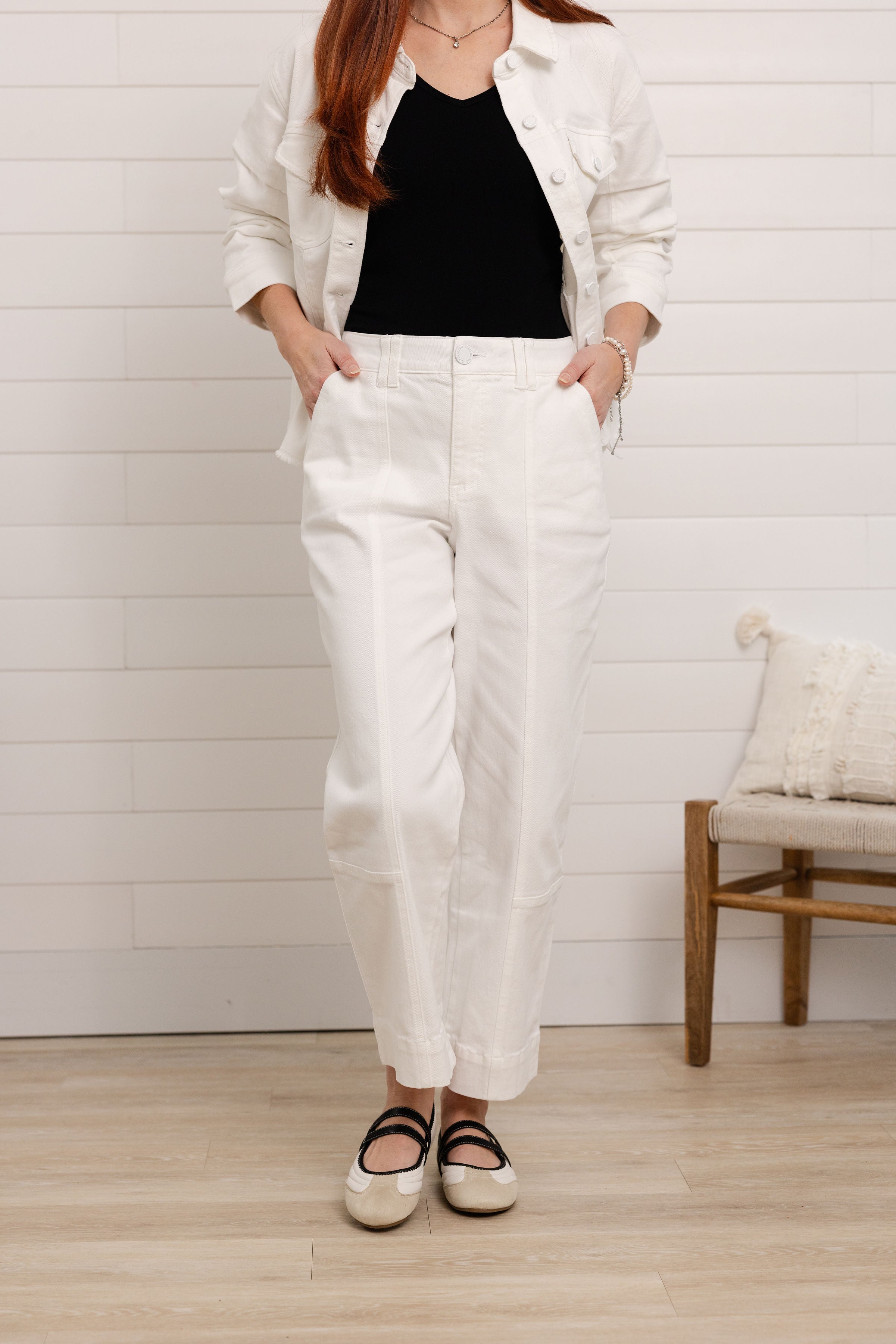 High rise white denim jeans with relaxed straight leg fit