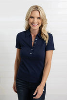 Model wearing Mac and Me navy short sleeve collar top with dark denim