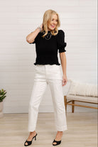 mac and me outfit featuring white optic pants and black smocked top