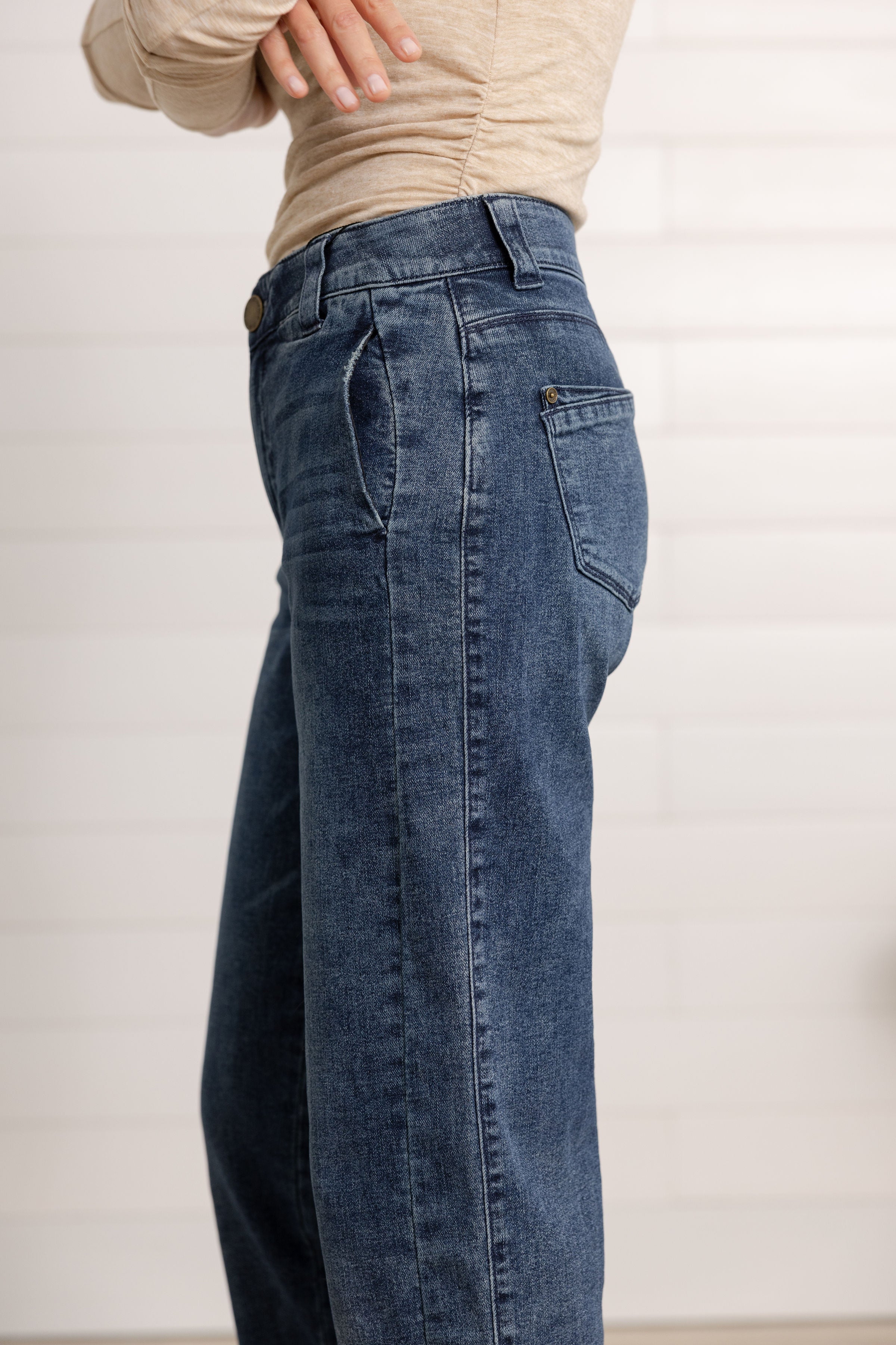 Showing the details of the side of the Mac and Me Boyfriend Jeans, including the slant trouser pocket style and the flattering side panel.