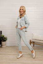 side view of Mac and Me bleached blue front seam kick flare jeans frayed hem