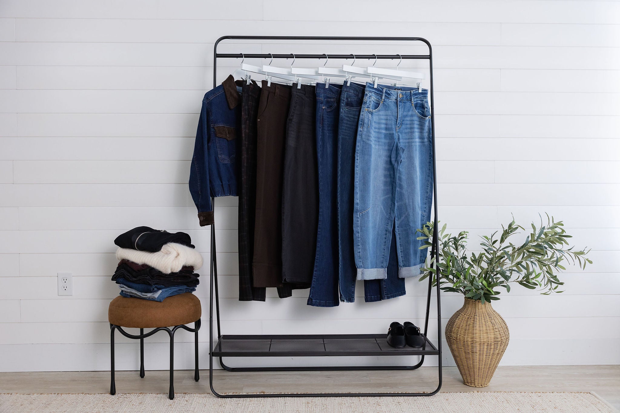 rack of denim representing the Mac and Me Collection