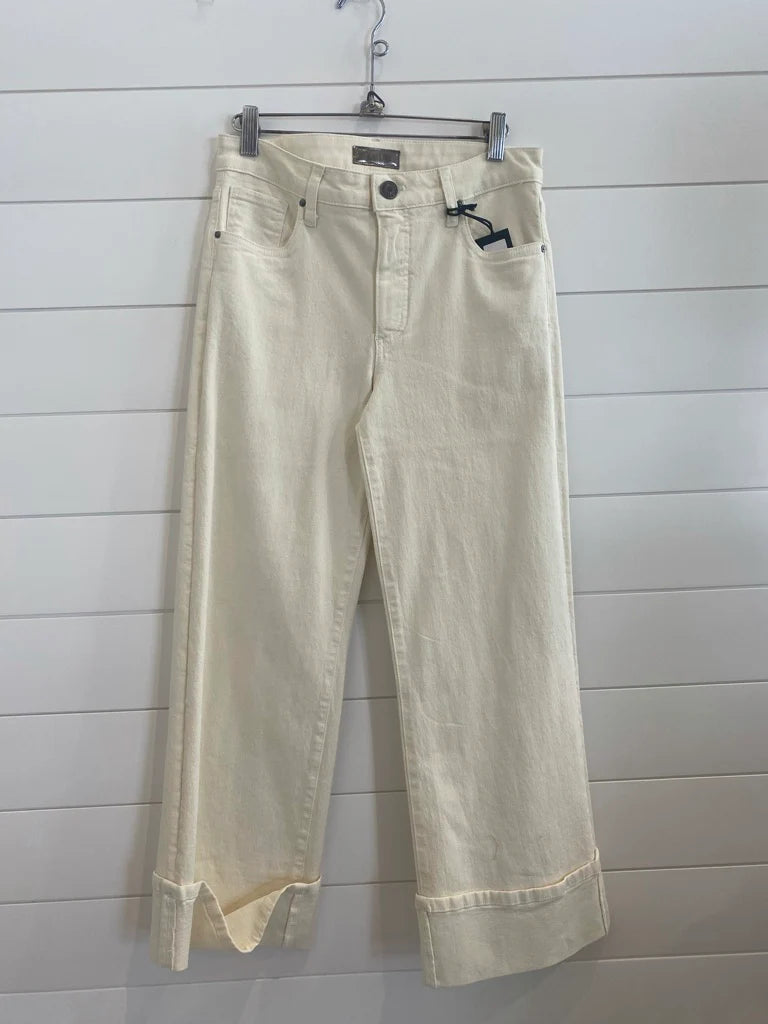 High rise wide leg denim with a bottom cuff in the color candle (ecru)