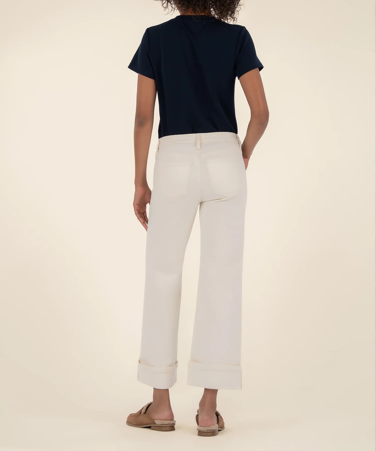 model showing the back of the meg high rise wide leg with bottom cuffs