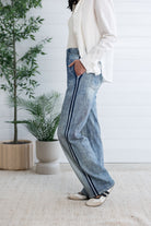 woman modeling side of lounge pant, the light blue Side Stripe Relaxed Denim Pant