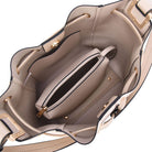 Showing the interior of the Ashby Handbag and the tote inside.
