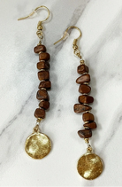 Pair of cocoa color beaded earrings with gold components 