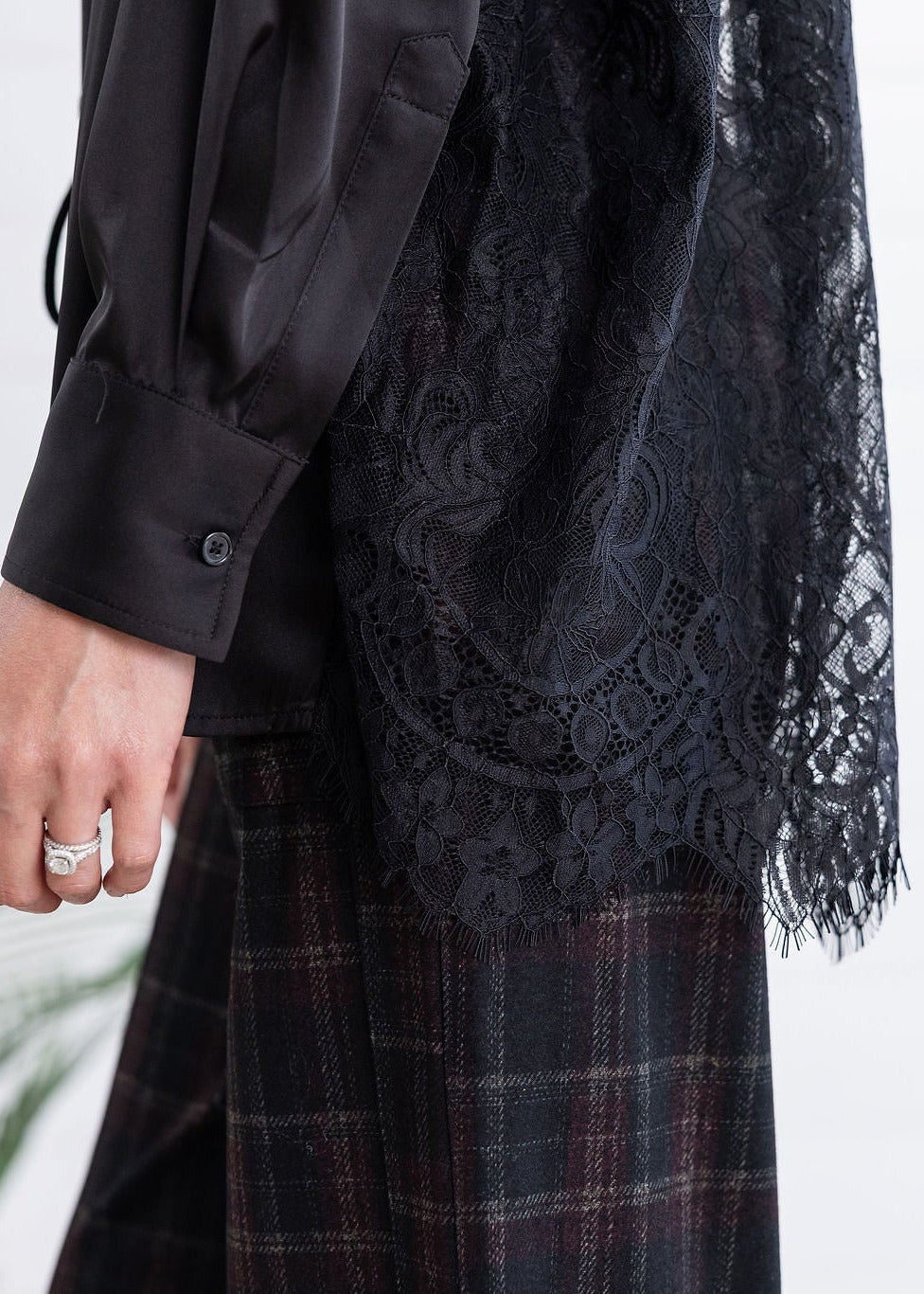 detailed view of black lace-back-button down-lace