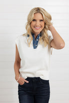 woman wearing the cap-sleeve top with denim collar with dark mac and me denim
