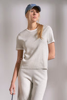 Grey ribbed crewneck top with white stripe detail on neckline and sleeves