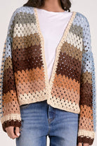 Details of the fall colors in stripes on a crochet knit cardigan
