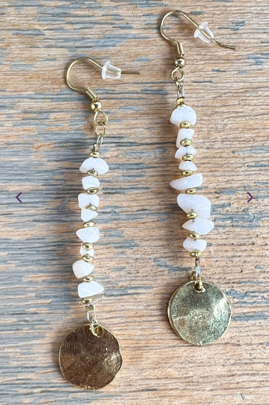 Pair of ivory beaded earrings with gold components 
