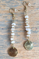Pair of ivory beaded earrings with gold components 