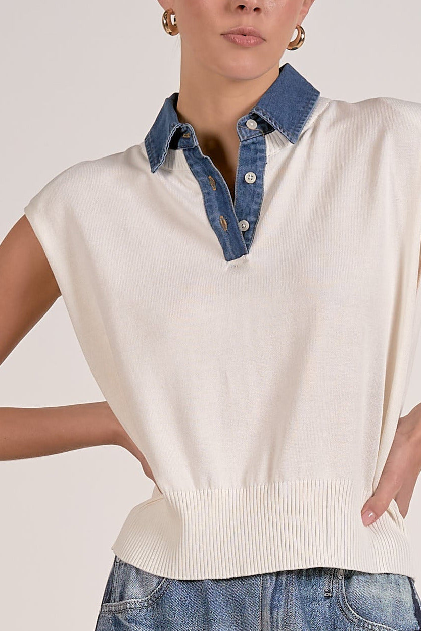 close up view of cap sleeve mixed media sweater top with contrast collar detail
