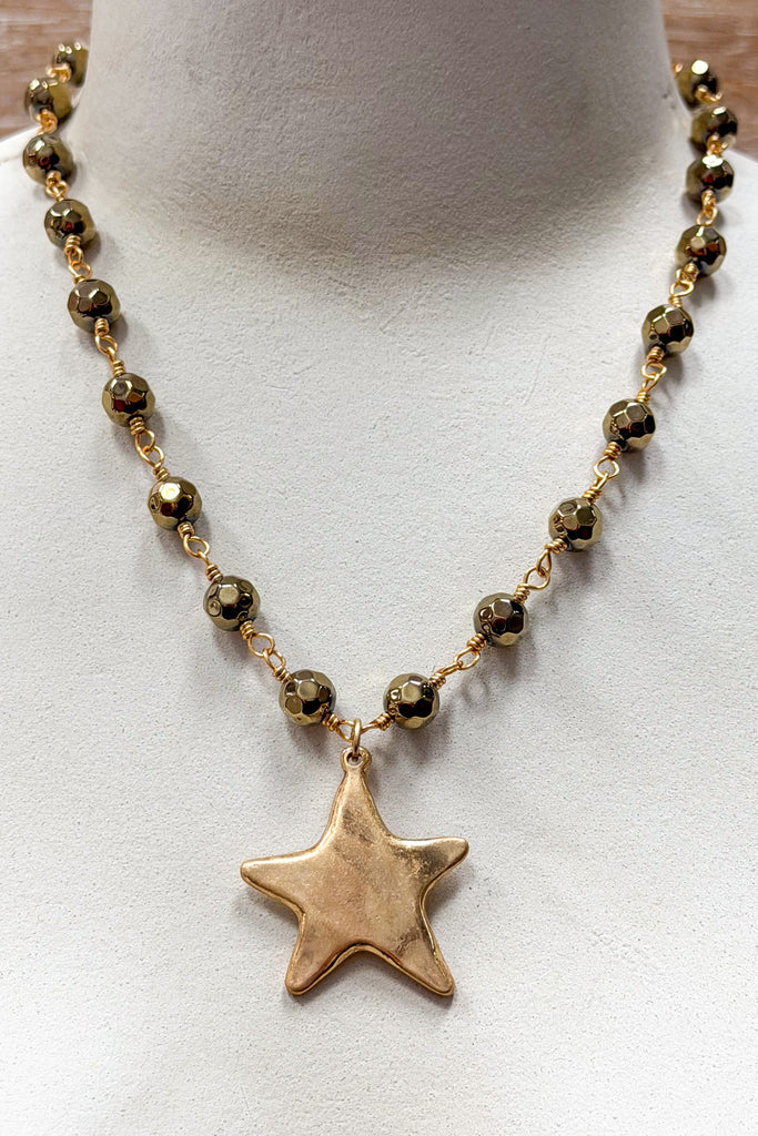 gold and bead short necklace with solid star pendant