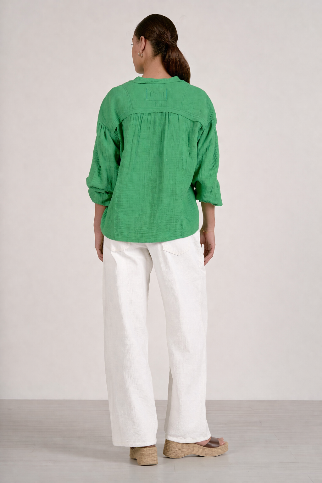 back of kelly green gauze top