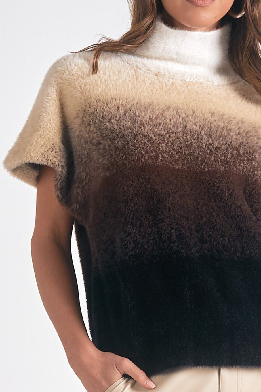 Model wearing Horizon Ombre Dolman Sweater in cream to black gradient knit with mock neck from Mainstream Boutique Bloomington