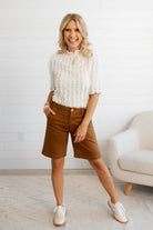 Woman posing in the Ivory Lettuce Edge Textured Knit Top and Hailey Bermuda Shorts