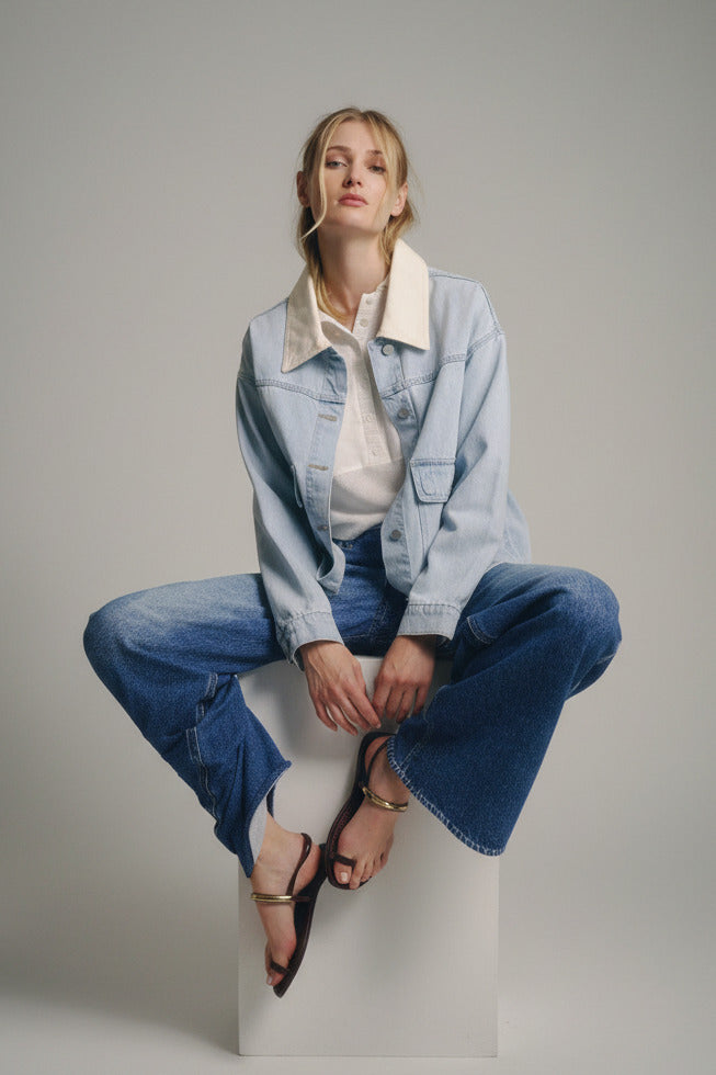 model in the blue wash denim jacket