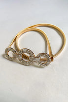 Gold stretch belt with oval rhinestone buckle style