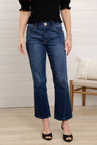 woman modeling front of mac and me barely boot denim in dark blue color with black top by Mac and Me 