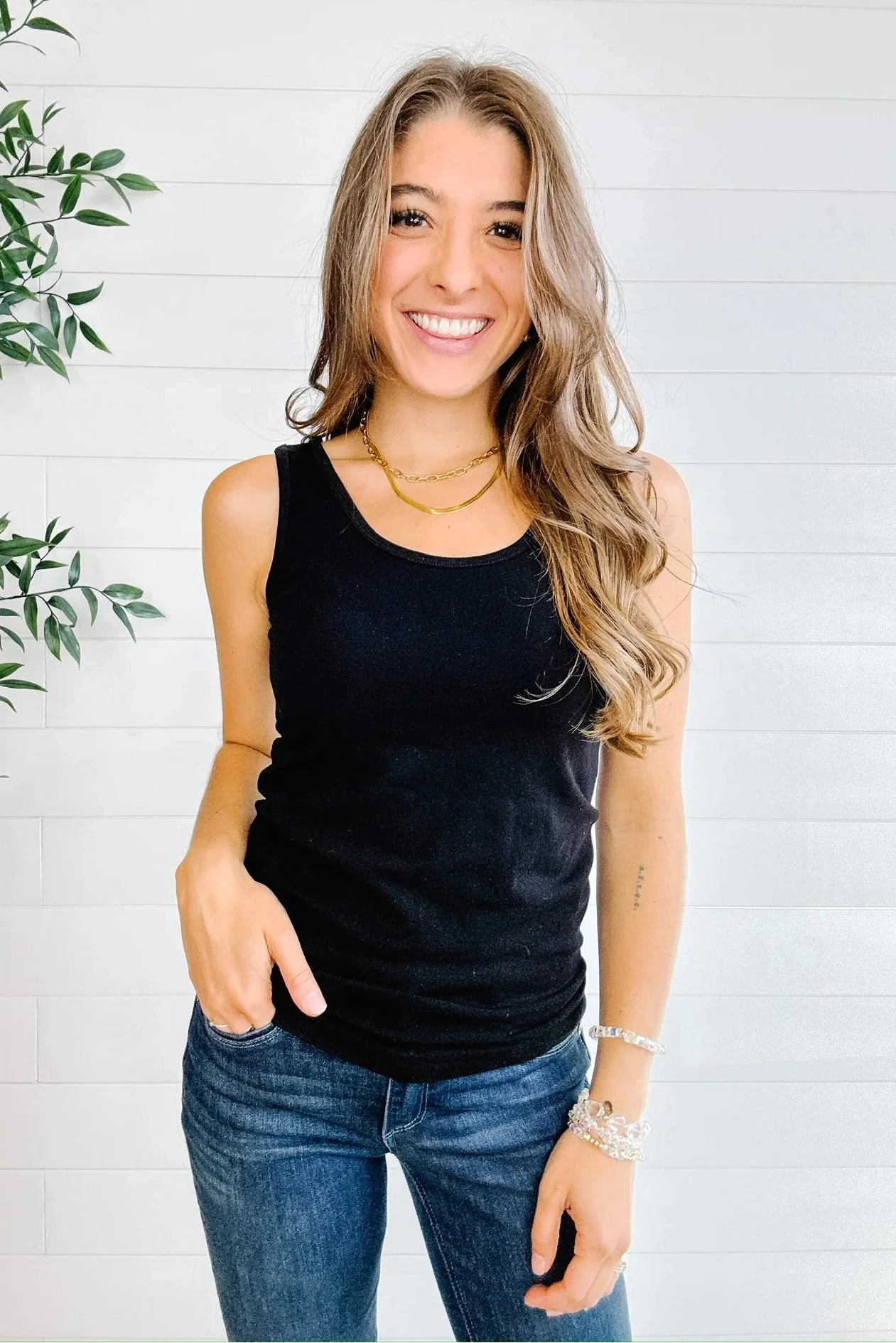 front of Mac and Me black essential fitted tank showing the scoop neck side