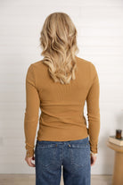 woman modeling the back of the button down ribbed henley in the color camel by Mac and Me