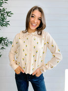 Mac and Me cream embroidered sunflower sweater with ruffle collar front view