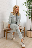 lifestyle picture of Mac and Me bleached blue ruched sleeve denim jacket with fray hem
