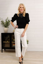 front outfit view of Mac and Me Relaxed Straight Leg Denim in optic white paired with Mac and Me black smocked top
