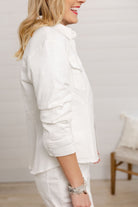 close up of the ruched sleeves on the mac and me white jean jacket