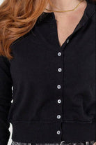 detailed view of mac and me solid black button front cardigan layering sweater