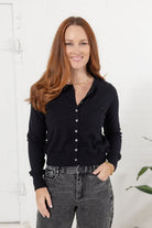 Front view of mac and me solid black button front cardigan layering sweater