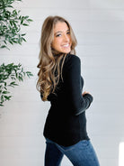 model showing the side view of the mac and me black ribbed waffle top
