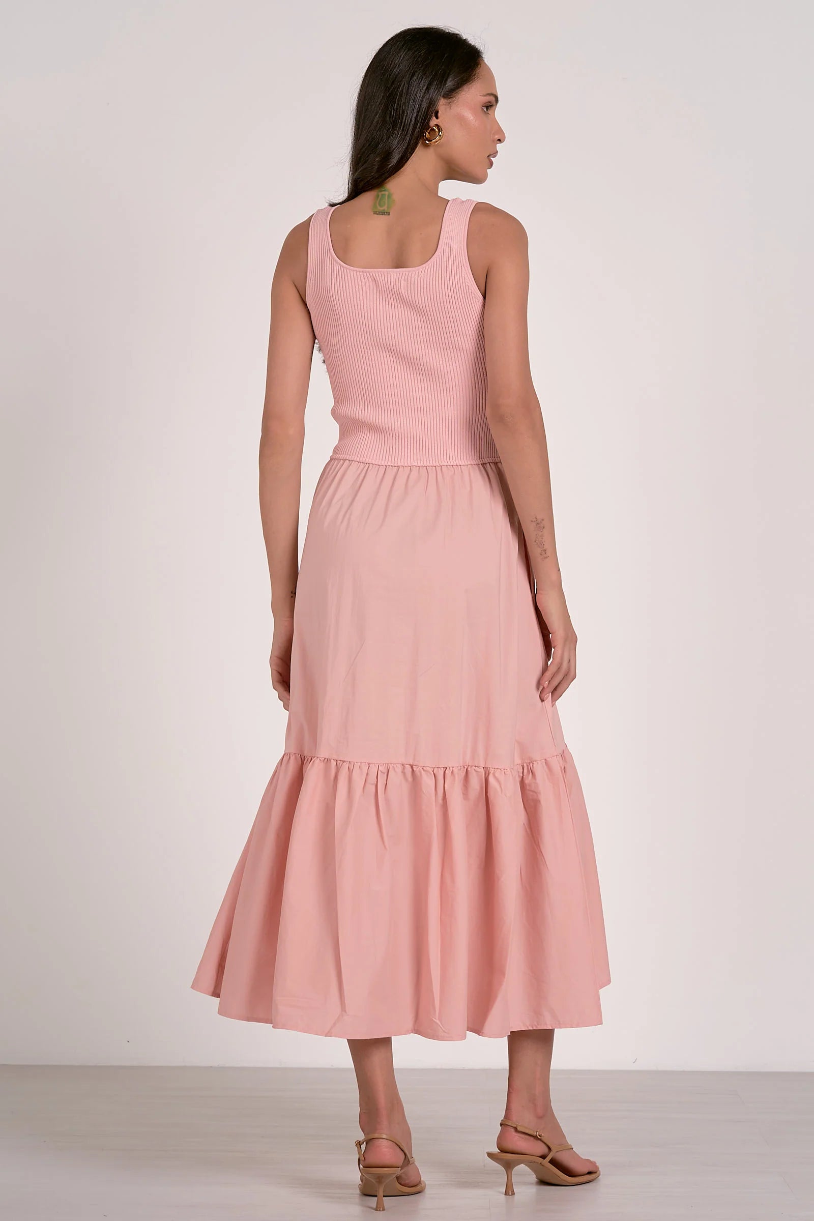 back view of blush ribbed knit mixed media midi dress with tiered skirt and pockets