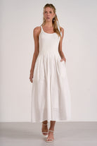 white summer dress midi length eyelet detail casual elegance