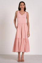 Blush ribbed knit mixed media midi dress with tiered skirt and pockets