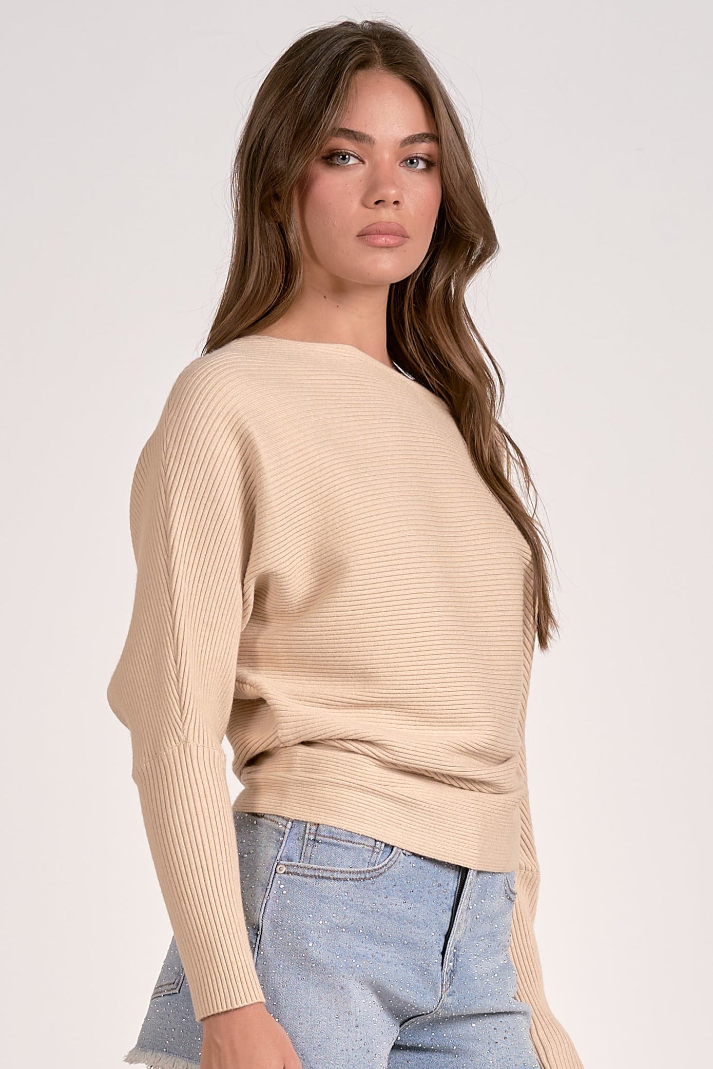 sand color off shoulder ribbed sweater styled denim