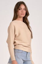sand color off shoulder ribbed sweater styled denim