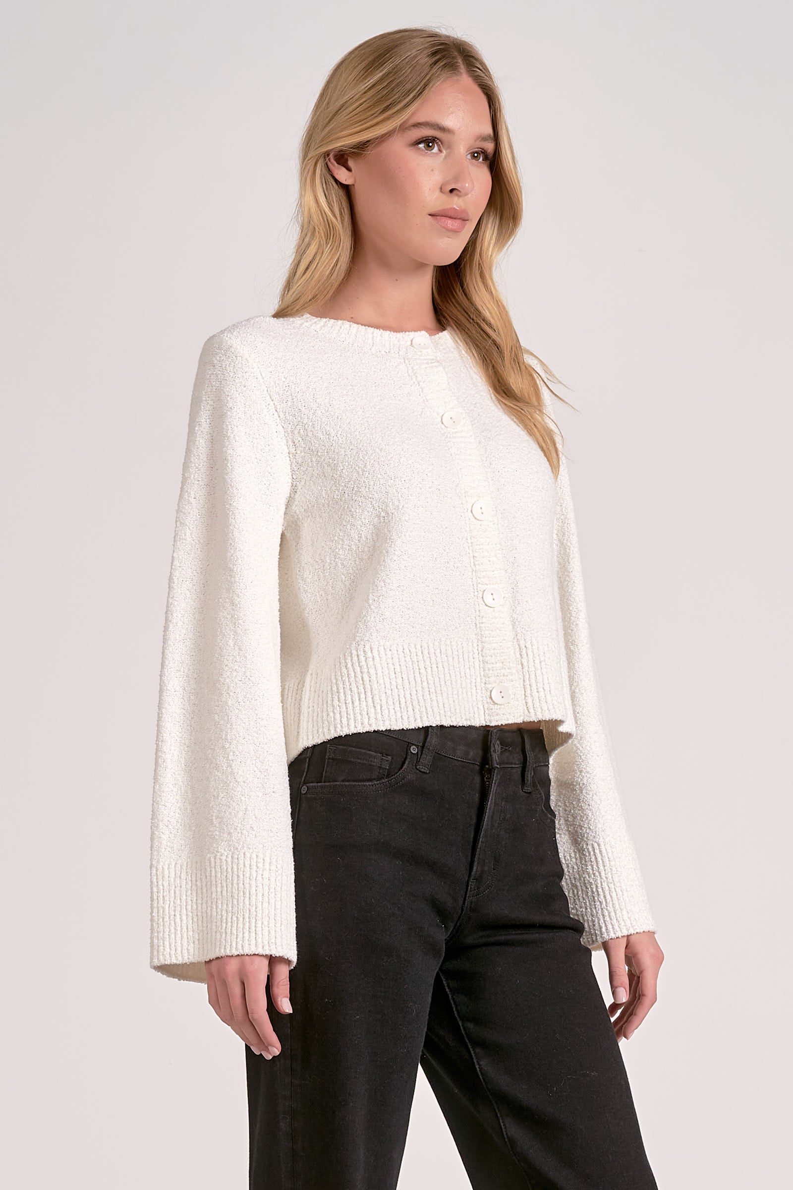 side of the ivory flare sleeve cropped knit cardigan for women