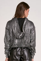 Back view of the silver Metallic Hoodie Sweater with relaxed fit and subtle shimmer from Mainstream Boutique Bloomington.