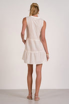 back of sleeveless tiered eyelet mini dress in white