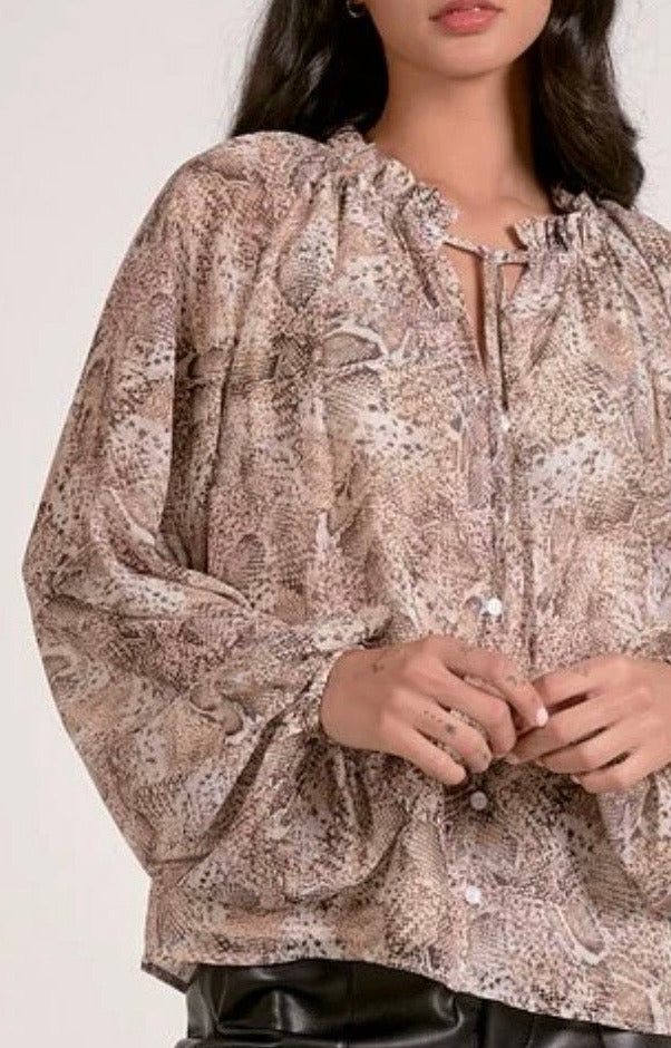 detail on snakeskin tie front blousy top