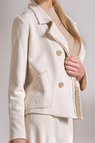 close up view of stone cotton knit blazer with relaxed structured fit