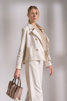 side view of stone cotton knit blazer with relaxed structured fit